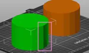 Zielony i pomarańczowy walec na siatce, element procesu projektowania 3D.