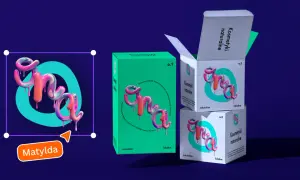 Kolorowy, błyszczący monogram "Matylda" na tle pudełek z kosmetykami naturalnymi.