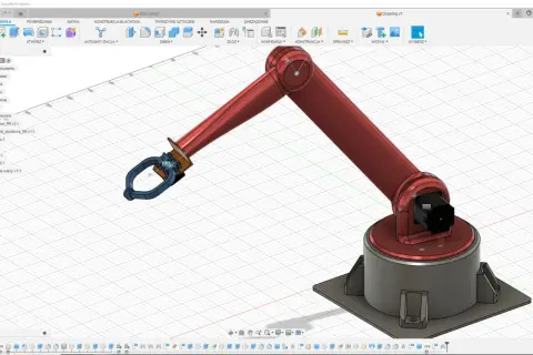 Model ramienia robota w programie CAD. Widoczny jest czerwony manipulator z chwytakiem, osadzony na obrotowej podstawie.
