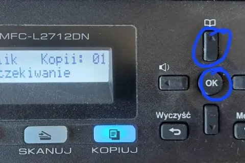 Przyciski "OK" i "Menu" na drukarce Brother MFC-L2712DN, pomocne gdy zastanawiasz się, jak zresetować drukarkę brother.