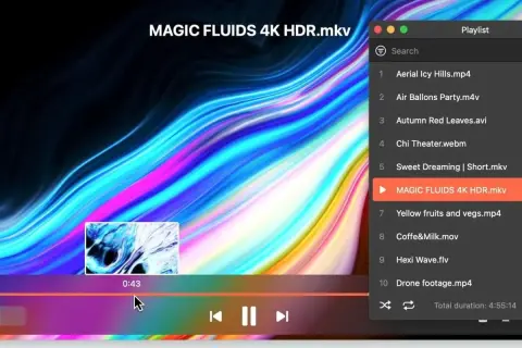 Odtwarzanie pliku MAGIC FLUIDS 4K HDR.mkv z kolorowym, płynnym tłem.