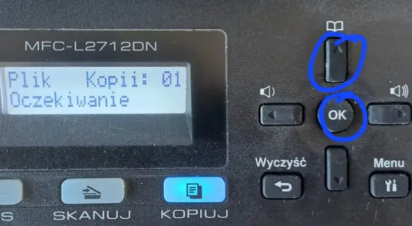 Przyciski "OK" i "Menu" na drukarce Brother MFC-L2712DN, pomocne gdy zastanawiasz się, jak zresetować drukarkę brother.