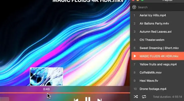 Odtwarzanie pliku MAGIC FLUIDS 4K HDR.mkv z kolorowym, płynnym tłem.