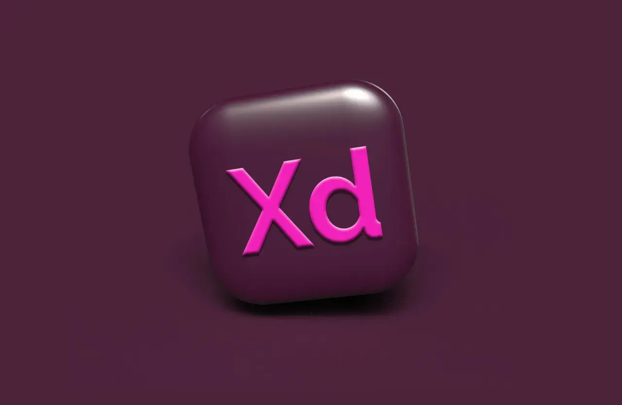 Ikona Adobe XD w kolorze fuksji na ciemnofioletowym tle. Narzędzie do projektowania interfejsów.